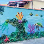 suite 1- apenas 9 min caminhando até as areias da praia